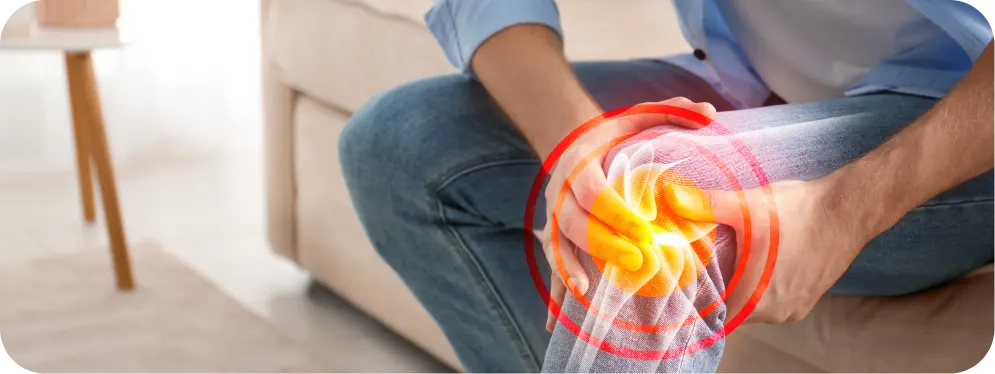 Person holding knee with highlighted pain showing symptoms of an osteochondral lesion and joint inflammation