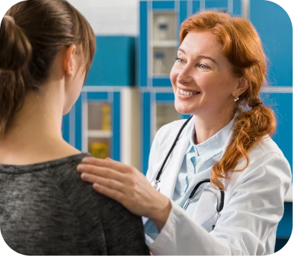 Female orthopedic specialist evaluating a patient’s shoulder during consultation for a suspected SLAP lesion (labrum tear)